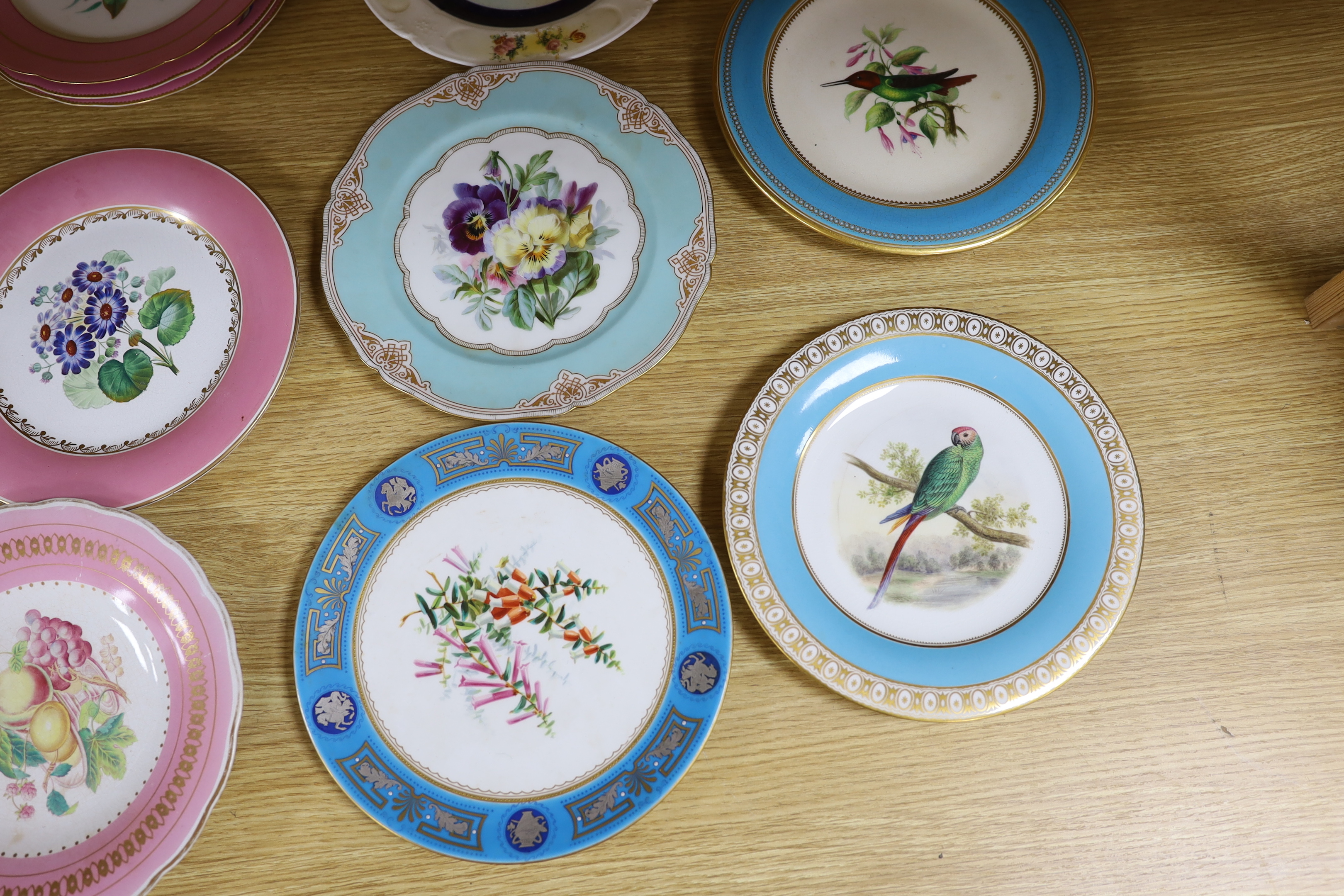 An English floral decorated comport and nine dessert plates, together with ten mixed floral patterned plates, largest 28cm in diameter